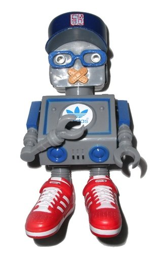 DJ Tommy figure by Cmd, produced by Adidas. Front view.