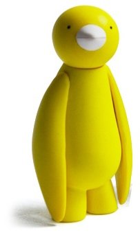 Yellow Ji Ja Bird figure by Mr. Clement. Front view.