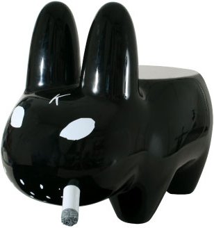 Smorkin Labbit Stool figure by Frank Kozik, produced by Kidrobot. Front view.