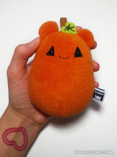 Pumpkin Cavey (Halloween) figure by A Little Stranger. Front view.