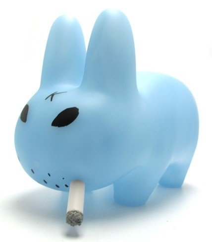 Smorkin’ Labbit - Clear Blue figure by Frank Kozik, produced by Kidrobot. Front view.
