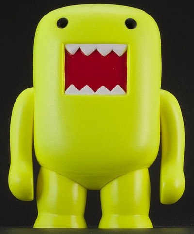 Domo Black Light - Yellow figure, produced by Dark Horse. Front view.
