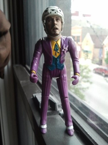 Pucking Orchid figure by J. Smith, produced by Custom. Front view.