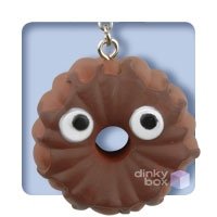 Bundt Cake Chocolate figure by Heidi Kenney, produced by Kidrobot. Front view.