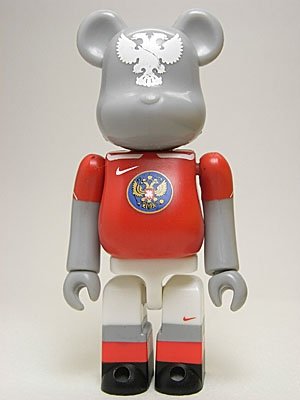 Joga Bonito Be@rbrick - Poland figure by Nike, produced by Medicom Toy. Front view.