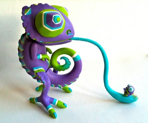 Chameleon - Purple figure by Kathleen Voigt . Front view.