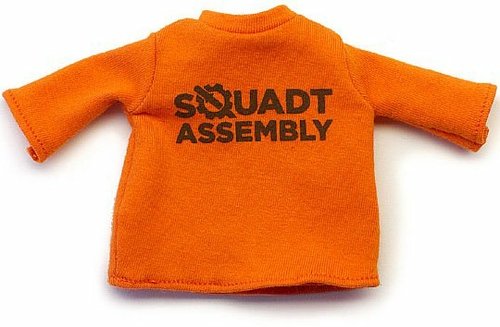 Squadt SA Logo Orange Tee figure by Ferg, produced by Playge. Front view.