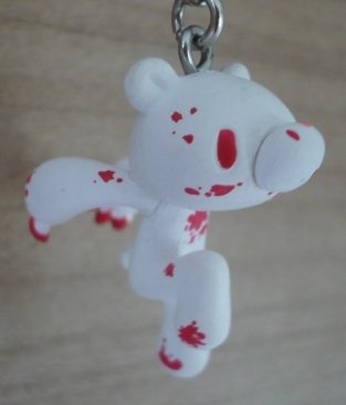 Gloomy Bear Zipper Pull (Bloody Albino) figure by Mori Chack, produced by Kidrobot. Front view.