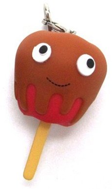 Red Toffee Apple figure by Heidi Kenney, produced by Kidrobot. Front view.
