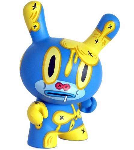 Baseman (Blue) figure by Gary Baseman, produced by Kidrobot. Front view.