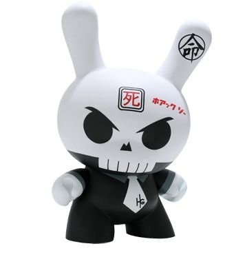 Skullhead 20  figure by Huck Gee, produced by Kidrobot. Front view.