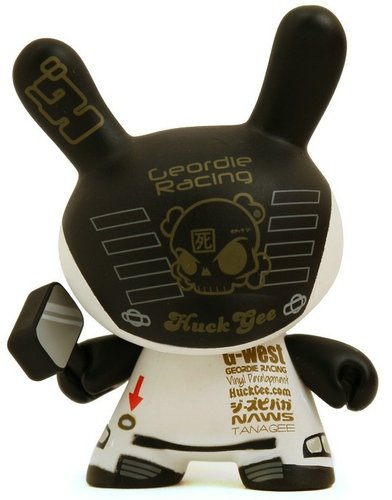 Huck Gee Dunny figure by Huck Gee, produced by Kidrobot. Front view.