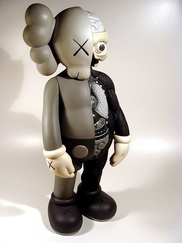 Dissected Companion - Mono  figure by Kaws, produced by Medicom Toy. Front view.