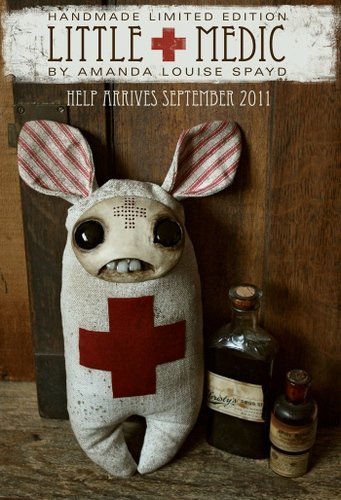 Little medic figure by Amanda Louise Spayd. Front view.