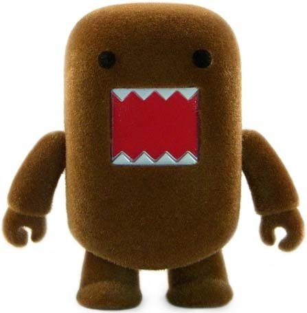 Brown Flocked Domo Qee figure by Dark Horse Comics, produced by Toy2R. Front view.