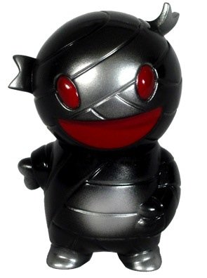 Pocket Mummy Boy figure by Brian Flynn, produced by Super7. Front view.