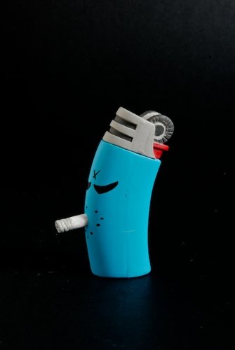 Monger Blue Lighter figure by Frank Kozik, produced by Kidrobot. Front view.