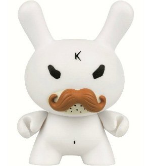 Ski Instructor Dunny figure by Frank Kozik, produced by Kidrobot X Swatch. Front view.