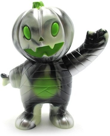 Pumpkin Boy - Black And Glow Swirl figure by Brian Flynn, produced by Super7. Front view.