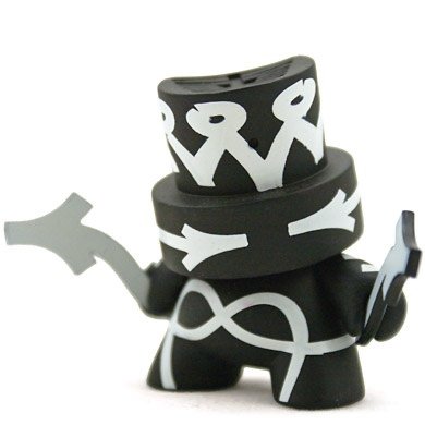 (Untitled) figure by Jeremy Madl (Mad), produced by Kidrobot. Front view.
