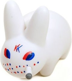 Smorkin Labbit 3D figure by Frank Kozik, produced by Kidrobot. Front view.