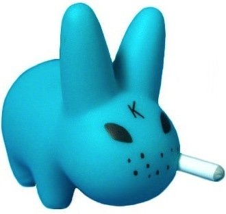 Teal Smorkin Labbit figure by Frank Kozik, produced by Kidrobot. Front view.