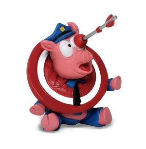 In a Pigs Eye figure by Seen, produced by Planet 6. Front view.