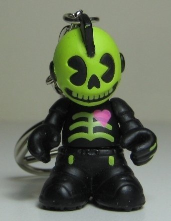 Glow in the Dark Skully  figure, produced by Kidrobot. Front view.