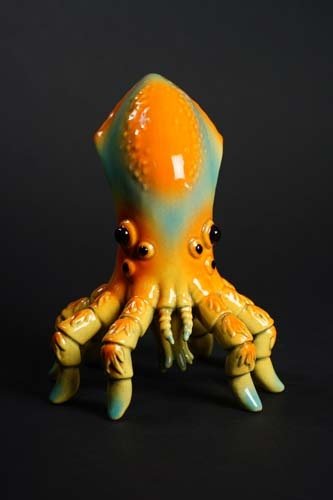 Ikakumora Yellow 1 figure by Miles Nielsen, produced by Munktiki. Front view.