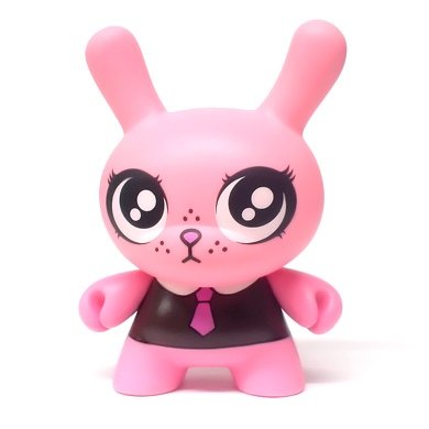 Pink figure by Fawn Gehweiler, produced by Kidrobot. Front view.