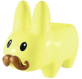 Yellow Stache Labbit Stool (Art Giants) figure by Frank Kozik. Front view.