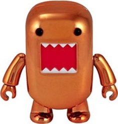 Metallic Orange Domo Qee figure by Dark Horse Comics, produced by Toy2R. Front view.