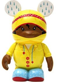 Yellow Raincoat figure by Maria Clapsis, produced by Disney. Front view.