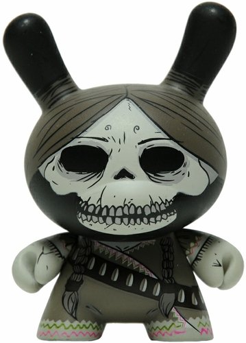 Adelita - Mono figure by Oscar Mar, produced by Kidrobot. Front view.