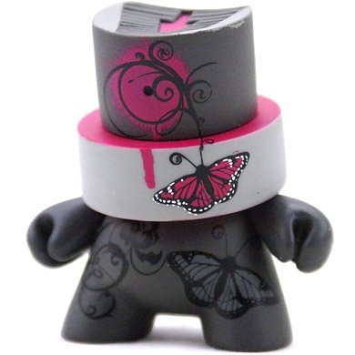 (Untitled) figure by Nathalie Oswald, produced by Kidrobot. Front view.