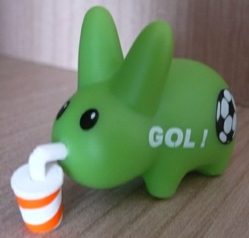 Happy Labbit figure by Frank Kozik, produced by Kidrobot. Front view.