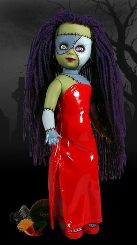Calico figure by Ed Long & Damien Glonek, produced by Mezco. Front view.