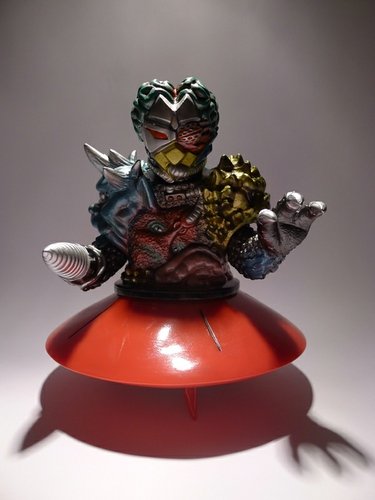 Death Climax Biological K.I. Red Disc figure, produced by Toygraph. Front view.