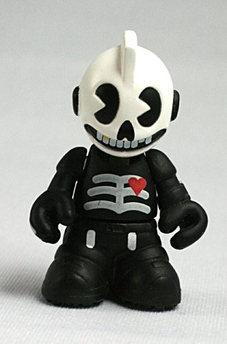 Skully figure, produced by Kidrobot. Front view.