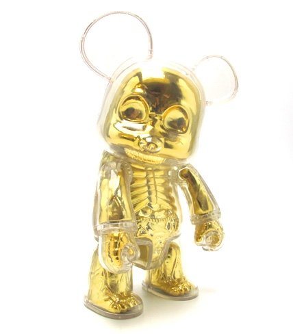 7  Qee Transparent Gold Skull figure, produced by Toy2R. Front view.