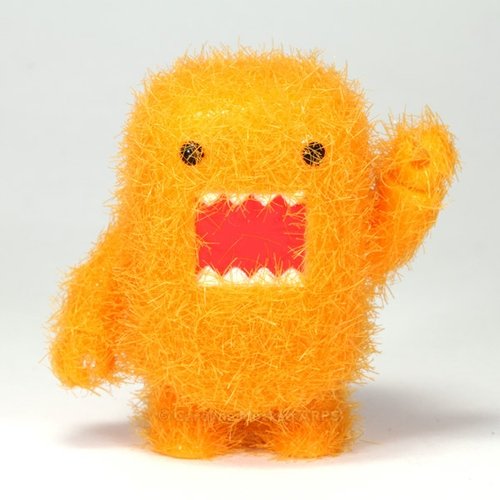 Fuzzy Orange Domo Qee figure by Dark Horse Comics, produced by Toy2R. Front view.