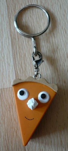 Orange Cake figure by Heidi Kenney, produced by Kidrobot. Front view.