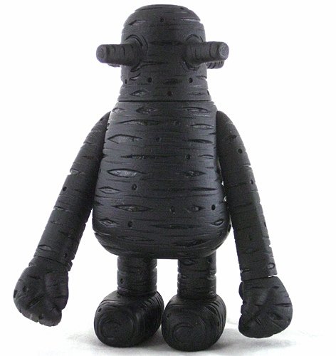 Baby Pascagoula Alien - Black figure by Michael Lau, produced by Mindstyle. Front view.