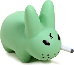 Smorkin Labbit - Mint figure by Frank Kozik, produced by Kidrobot. Front view.