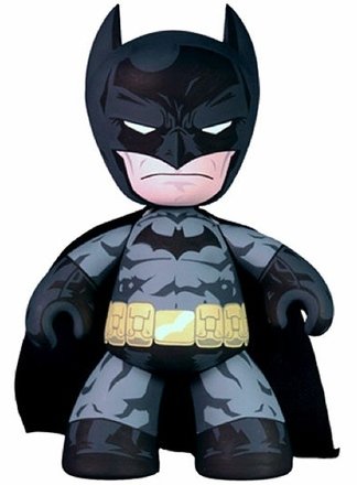 Batman figure by Dc Comics, produced by Mezco Toyz. Front view.