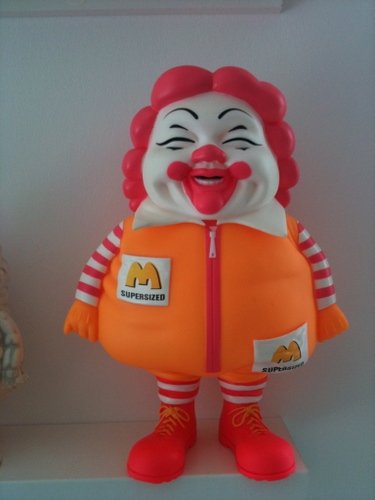 MC Supersized  figure by Ron English. Front view.