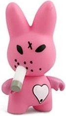 Pink Bunny figure by Frank Kozik, produced by Kidrobot. Front view.