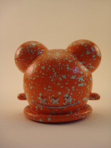 Orange Sherbert Buff figure by Brandon Morrow, produced by Mindstyle. Front view.