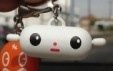 Luckies Zipper pull figure by Friends With You, produced by Kidrobot. Front view.