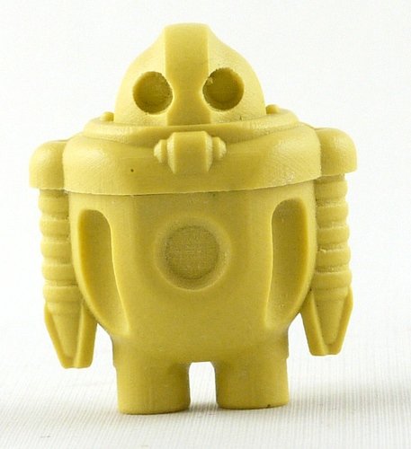 Yellow Rigel figure by Cris Rose. Front view.